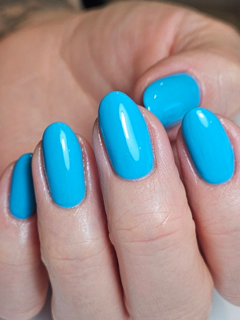 Bright turquoise blue builder gel nails on natural nails - Amy Suchowij Nail Salon Ipswich